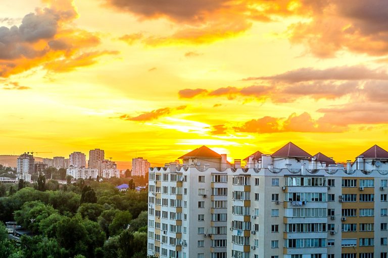 gray-white-high-rise-building-during-sun-set-205078